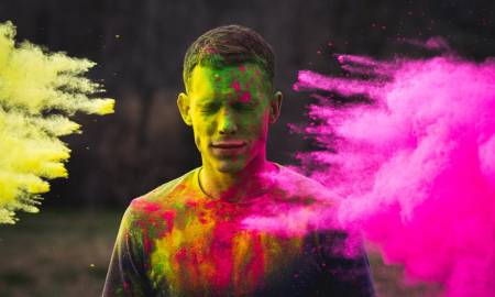 man-eyes-closed-color-pink-yellow-holi