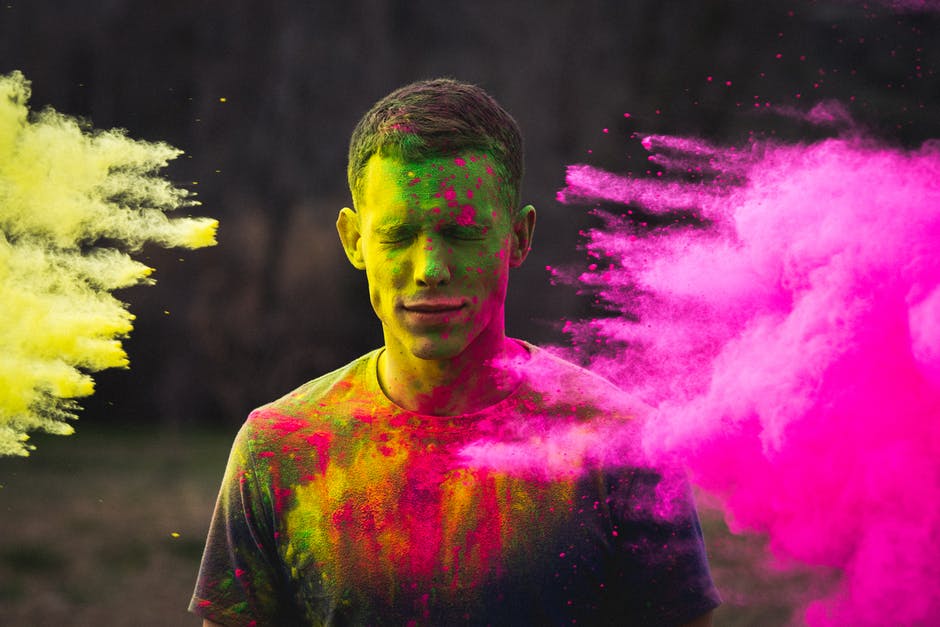 man-eyes-closed-color-pink-yellow-holi