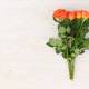 Why Orange Roses and Red Hypericum Bouquets Make a Thoughtful Hostess Gift